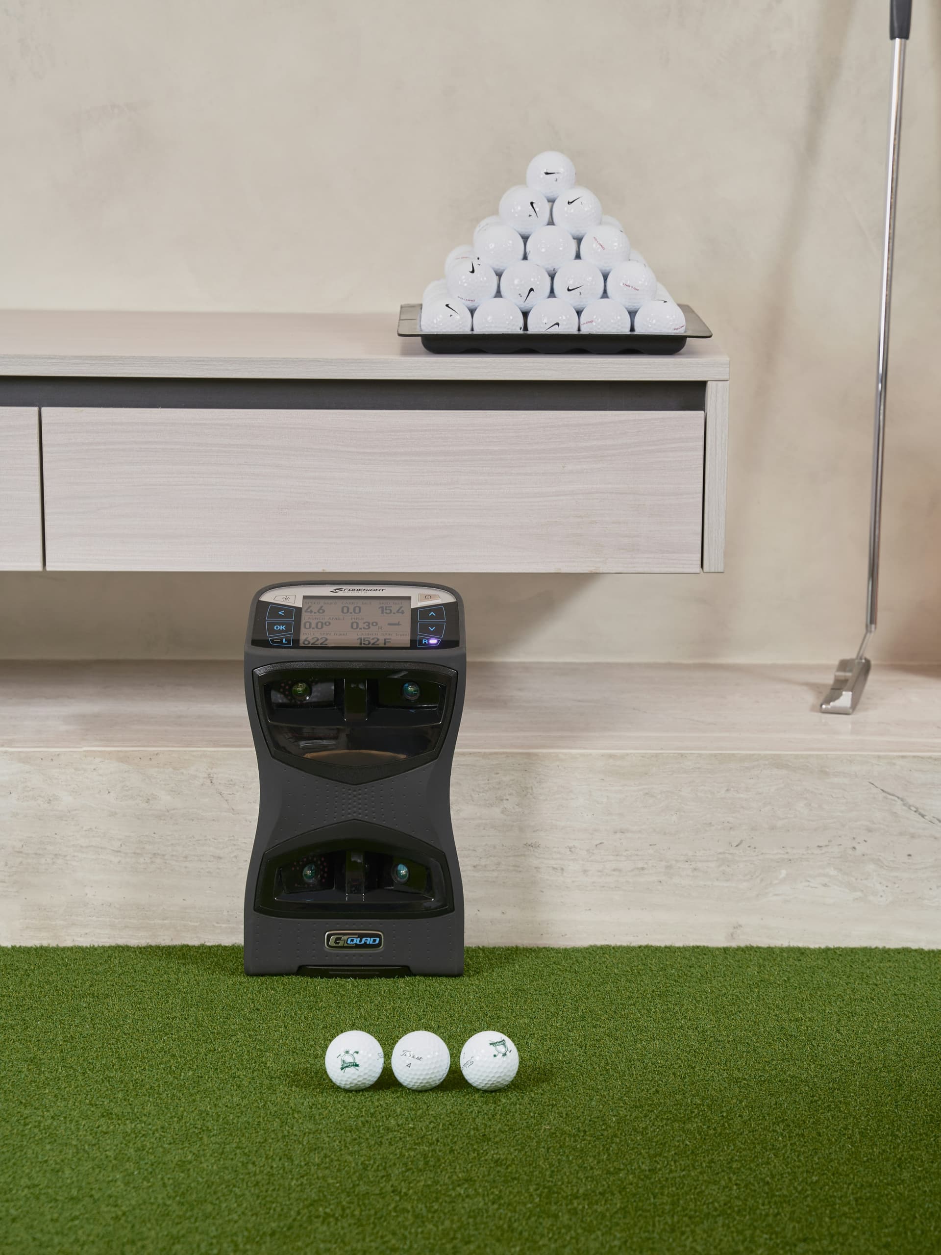 Foresight GCQuad launch monitor on simulator mat